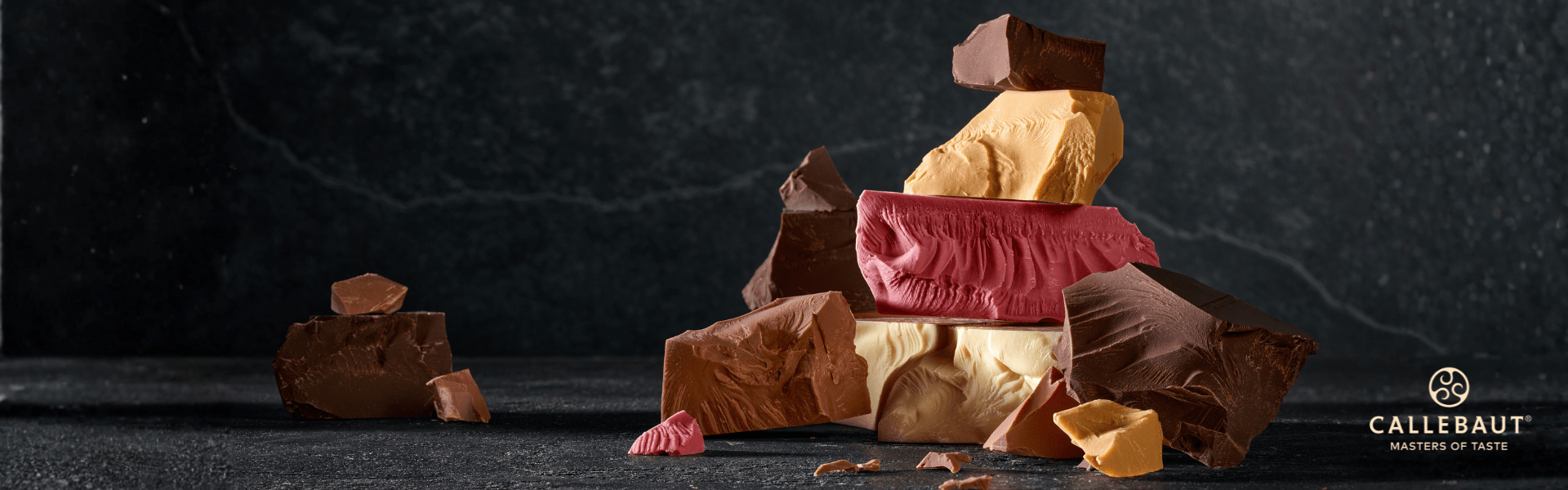 Chunks of milk, dark, white, gold, and ruby chocolate