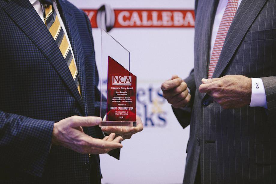 Jerry Hagedorn, EVP Business Development accepting the award from John Downs of the NCA
